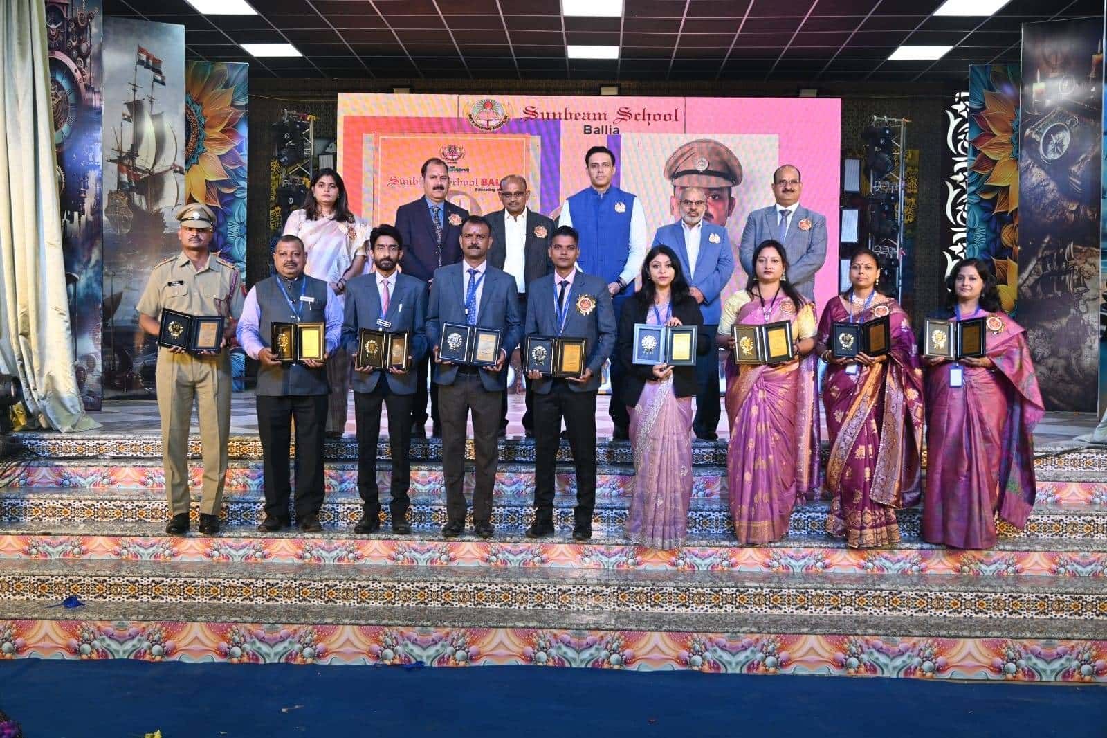 An award ceremony on stage in the hall at Sunbeam School Ballia